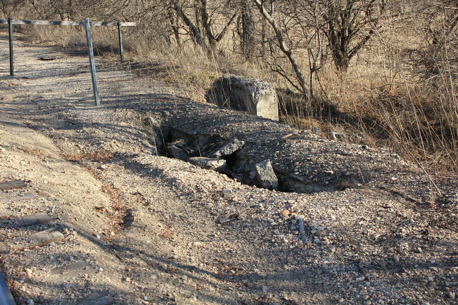 Failing east abutment at unused track